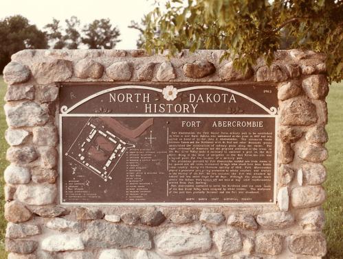 Historical marker for Fort Abercrombie in North Dakota, detailing its significance and layout.