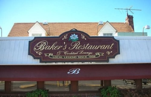 Sign for Baker's Restaurant & Cocktail Lounge, featuring "Local Legend Since 1958" in decorative lettering.