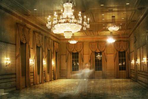 A grand, empty ballroom with elegant chandeliers and draped windows, featuring a soft, ethereal figure in motion.