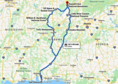 Map showing a route from Gulf Shores, Alabama, to Russell Cave National Monument, with key stops and travel time.