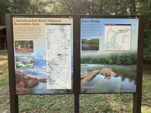 Information signs for Chattahoochee River National Recreation Area and Jones Bridge, featuring maps and descriptions.