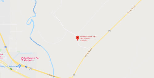 Map showing Homolovi State Park, highlighting trails, a museum, and nearby highways.