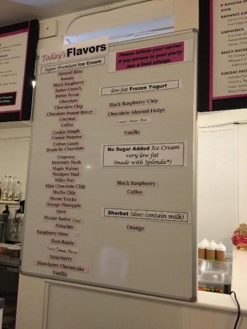 Menu board displaying today's ice cream flavors, including low-fat options and no sugar added varieties.