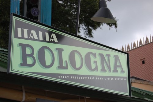 Sign for Bologna at the Epcot International Food & Wine Festival, featuring green and black lettering.
