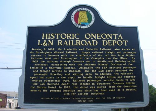 Historic marker for the Oneonta L&N Railroad Depot, detailing its history and significance in Alabama.