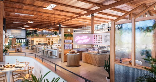 Bright, modern café interior with wooden beams, plants, and a vibrant neon sign, featuring a display of pastries and seating areas.