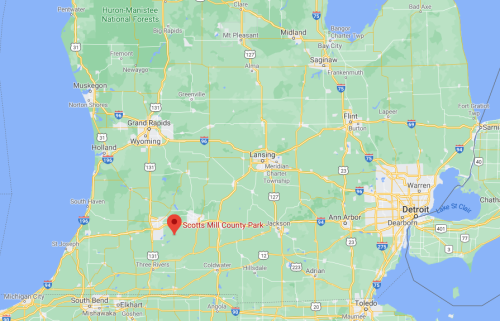 Map showing Scotts Mill County Park in Michigan, near Jackson, with surrounding highways and cities labeled.