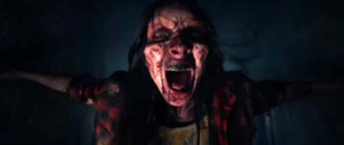 A terrifying figure with distorted features and an open mouth, set in a dark, eerie environment.