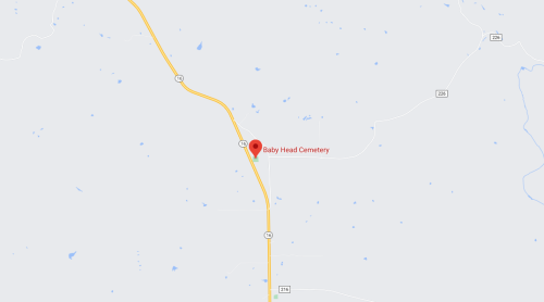 Map showing the location of Baby Head Cemetery along a highway, with surrounding areas marked in light blue.