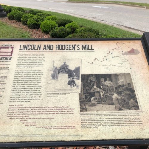 Informational sign about Lincoln and Hodgen's Mill, featuring historical images and text about the area's significance.