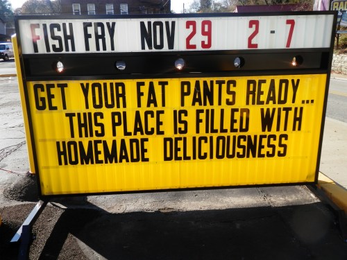 Sign promoting a fish fry event on November 29, encouraging diners to prepare for delicious homemade food.