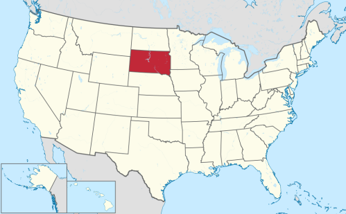 Map of the United States highlighting North Dakota in red, with a smaller inset of Hawaii.