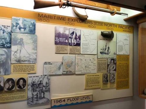 Display of maritime explorers of the North Pacific, featuring maps, images, and historical information from 450 AD to 1800.