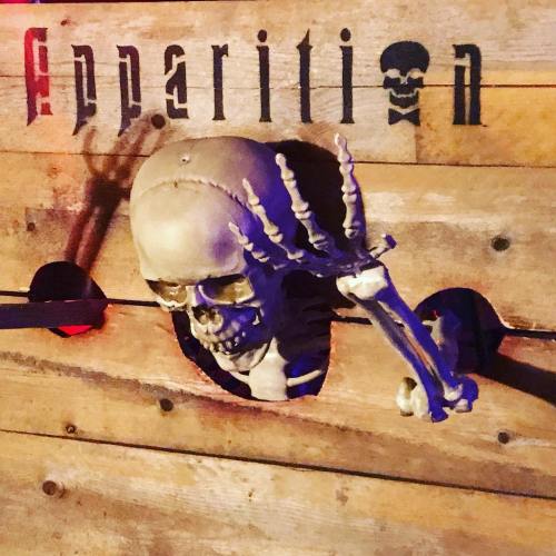 A skull with a bony hand protrudes from a wooden wall, with the word "Separation" above it in a spooky font.