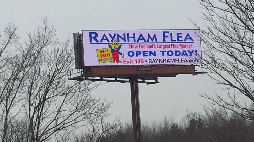 Billboard for Raynham Flea Market, promoting over 700 vendors and open today, located at Exit 13B.