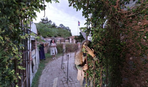 A spooky scene in a graveyard with eerie figures among overgrown vines and tombstones, creating a haunting atmosphere.