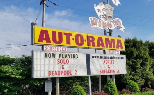 Sign for Aut-O-Rama Drive-In featuring movies "Solo," "Deadpool 2," and "Adrift" on display.