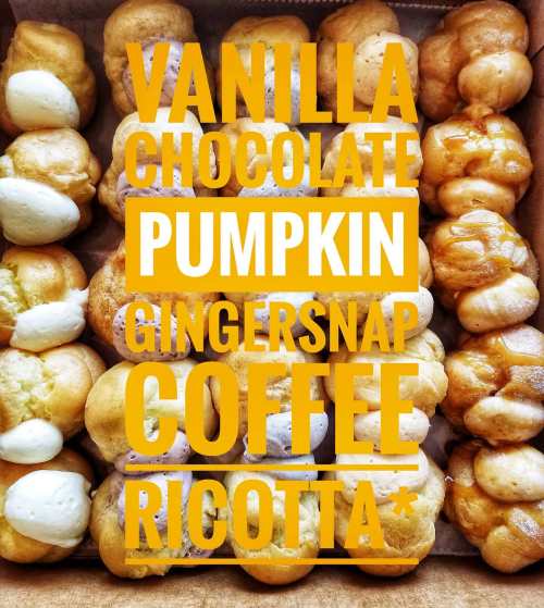 A box of assorted pastries labeled with flavors: vanilla, chocolate, pumpkin, gingersnap, coffee, and ricotta.