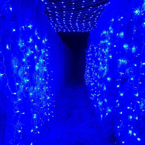 A dimly lit corridor adorned with vibrant blue fairy lights on either side, creating a magical atmosphere.