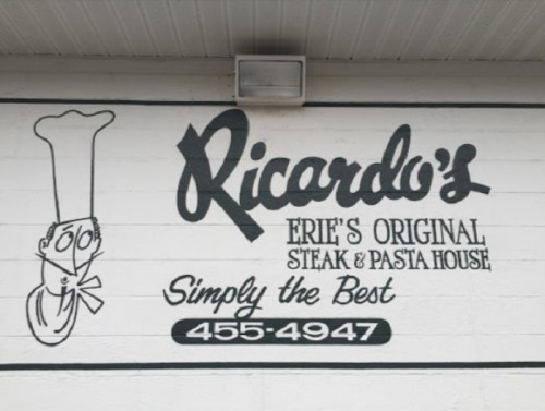 Sign for Ricardo's, Erie's Original Steak & Pasta House, featuring a chef illustration and the text "Simply the Best."