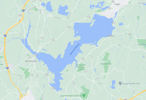 Map showing a large lake surrounded by green areas, roads, and nearby towns like West Boylston and Clinton.