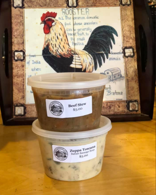 Two containers of soup labeled "Beef Stew" and "Zuppa Toscana," priced at $5 each, with a rooster illustration in the background.