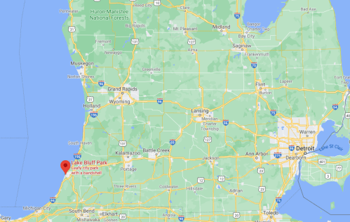 Map showing Lake Bluff Park in Michigan, near the coast, with nearby cities and highways marked.