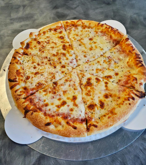 A round cheese pizza with golden crust, sliced into eight pieces, on a silver serving tray.