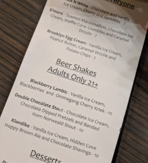 Menu items including beer shakes, desserts, and unique flavors like S'more and Brooklyn Egg Cream. Prices listed.