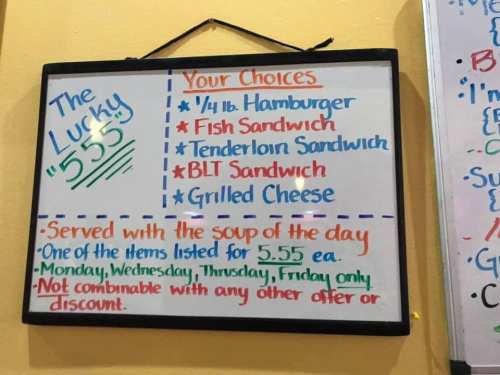 Menu board listing choices: hamburger, fish sandwich, tenderloin sandwich, BLT, and grilled cheese for $5.55 each.