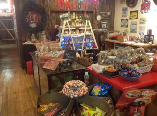 A cozy candy shop filled with colorful sweets, jars, and vintage decor, creating a nostalgic atmosphere.