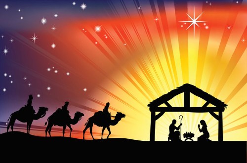 Silhouette of a nativity scene with three wise men on camels, a stable, and a bright star in a colorful sunset sky.