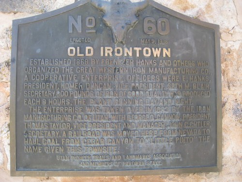 Plaque detailing the history of Old Irontown, established in 1896, highlighting key figures and events.