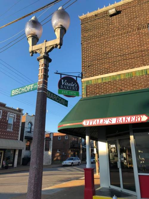 Sign for Vitale's Bakery, established in 1976, at the corner of Bischoff and Marcon streets.