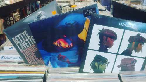 A collection of vinyl records displayed among other records, featuring covers by Bettye Lavette, Lorde, and Gorillaz.