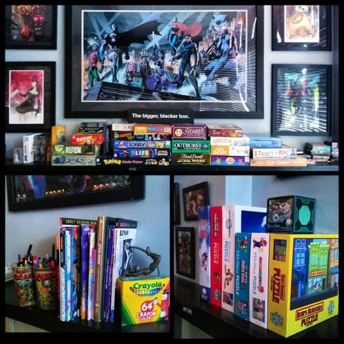A colorful display of board games, books, and art, featuring a superhero poster and various art supplies.