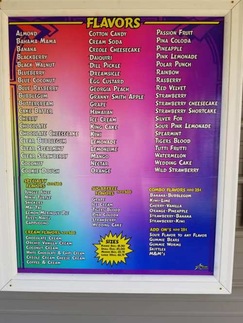 Menu board displaying various ice cream flavors, including Almond, Blueberry, Cotton Candy, and more, with size options.