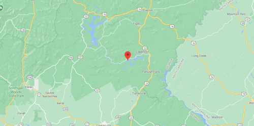 Map showing a green landscape with roads and a red marker indicating the location of Lakemont, Georgia.