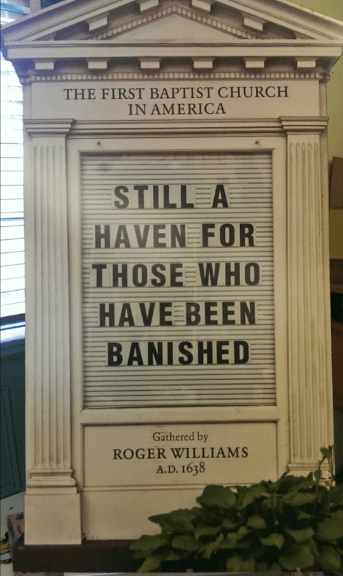 Sign for the First Baptist Church in America, stating it is a haven for the banished, gathered by Roger Williams in 1638.
