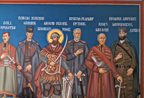 Mural depicting historical figures in military attire, standing together against a colorful background.