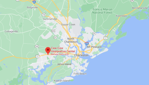 Map showing the location of Caw Caw Interpretive Center near Charleston, South Carolina, with nearby roads and landmarks.
