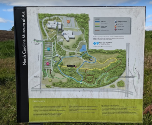Map of the North Carolina Museum of Art, showing trails, buildings, and park rules.