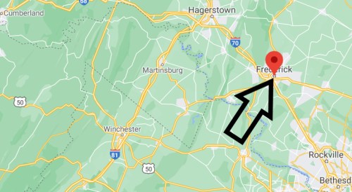Map showing Frederick, Maryland, highlighted with an arrow, surrounded by green areas and major highways.