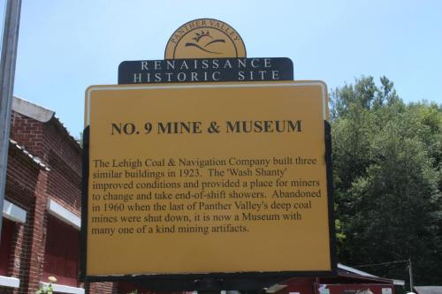 Sign for No. 9 Mine & Museum, detailing its history and significance in Panther Valley, established in 1923.