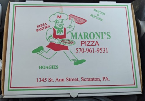 A pizza box from Maroni's Pizza featuring a cartoon chef and contact information, located in Scranton, PA.