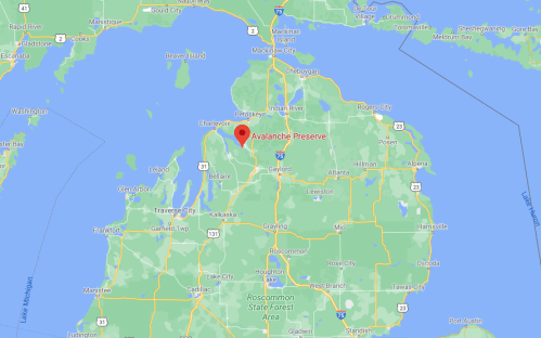 Map showing the location of Avalanche Preserve in northern Michigan, near Lake Michigan and surrounding towns.
