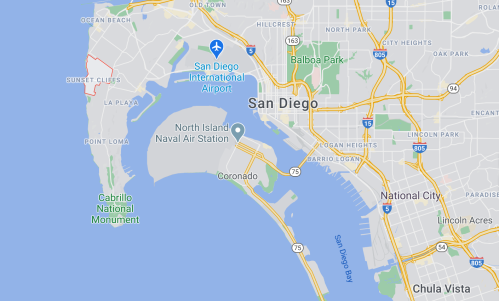 Map of San Diego, highlighting the airport, North Island Naval Station, and nearby landmarks.