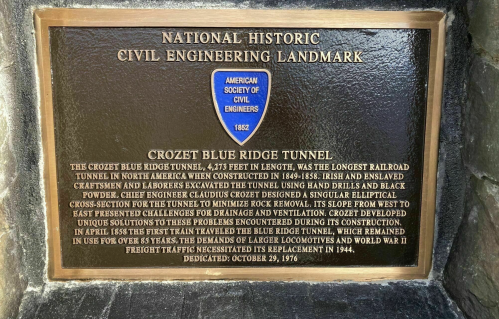 Plaque detailing the Crozet Blue Ridge Tunnel, a historic civil engineering landmark, highlighting its construction and significance.