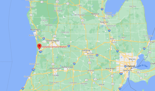 Map showing Michigan with a marker for Holland Farmers Market, near Lake Michigan and Grand Rapids.