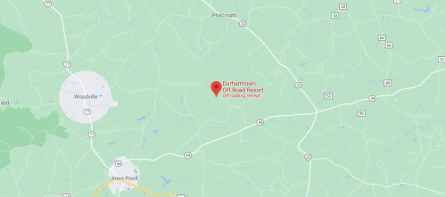 Map showing the location of Durhamtown Off Road Resort, surrounded by green areas and nearby roads.